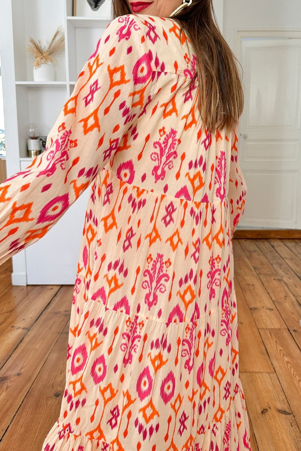Vestido largo naranja con estampado geométrico abstracto occidental