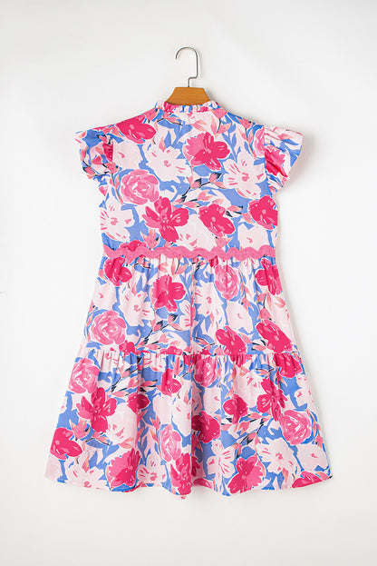 Vestido rosa con estampado floral, escote en V y mangas acampanadas