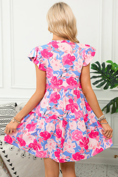 Vestido rosa con estampado floral, escote en V y mangas acampanadas